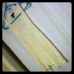 Beige tank with a cross cross back!