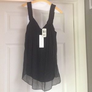 Awesome flowy DVF silk tank with crisscross back