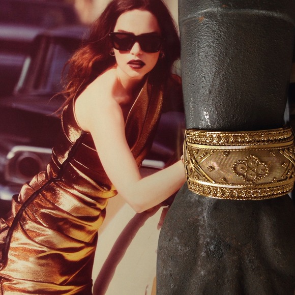 Detailed gold cuff bracelet