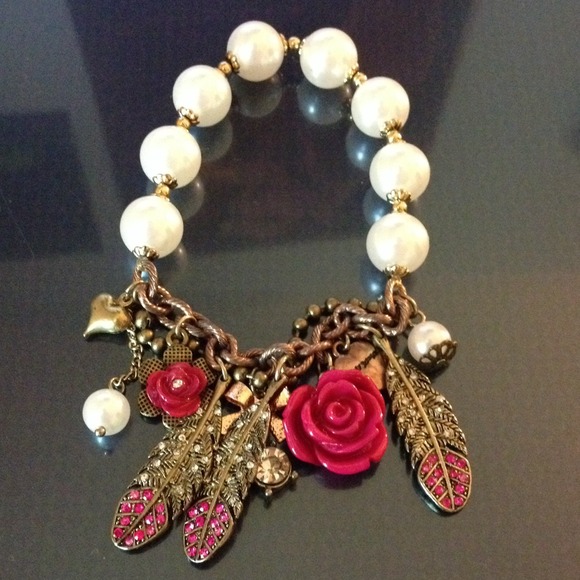 Betsey Johnson Jewelry - Betsey Johnson rose & feathers bracelet.