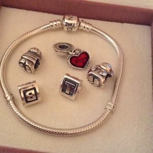 AUTH PANDORA BRACELET AND 5 CHARMS MAKE AN OFFER