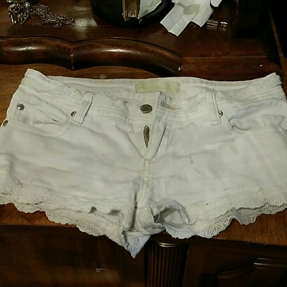 White Almost Famous ruffle trim shorts