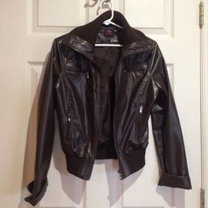 Size small bebe leather bomber jacket never worn.