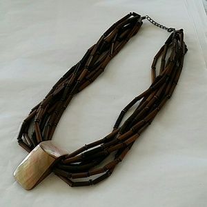 Necklace sold in a bundle.