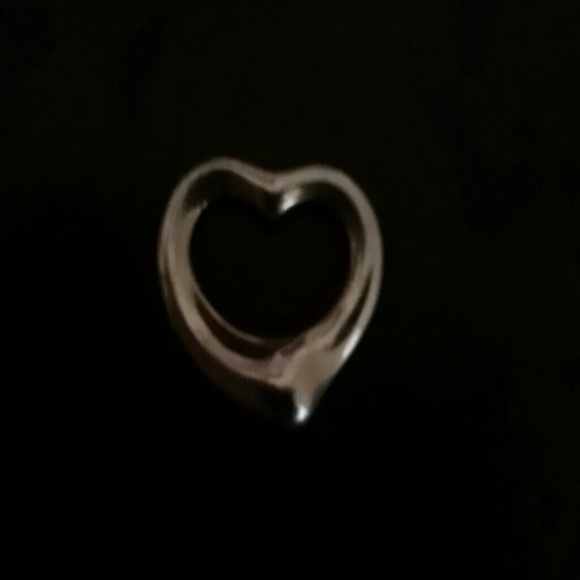 Tiffany open heart pendant. No chain just pendant.