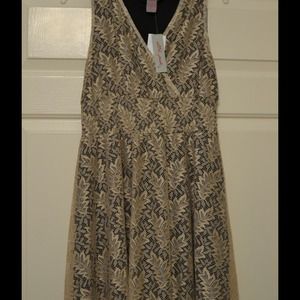 Khaki Lace dress with black lining.