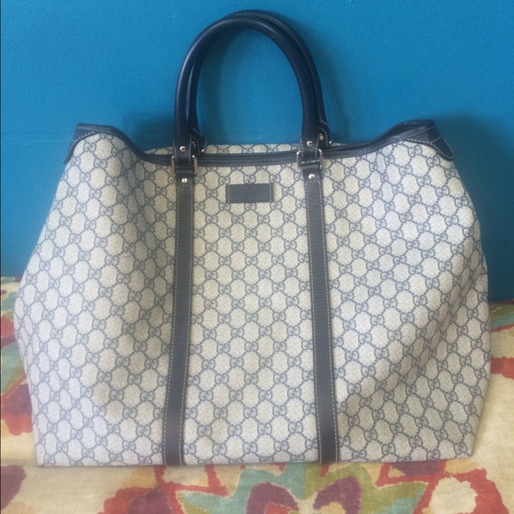 Authentic Gucci Duffle grey with navy trim