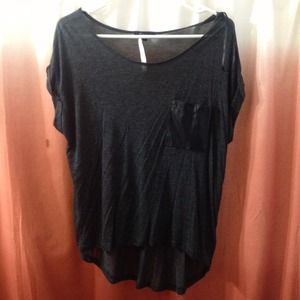Gray top with faux leather pocket