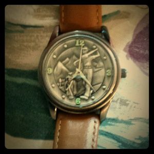 Genuine leather Avon watch.