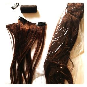 Dark brown hair extension. Never used