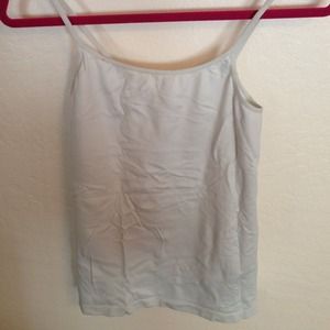 Seamless stretchy undershirt with adjustable strap