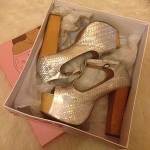 Silver hologram foxy platform by Jeffrey Campbell