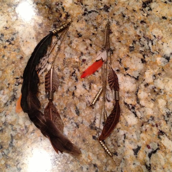 Feather earrings. Brand new
