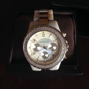 Michael Kors gold /ivory watch. Good condition.