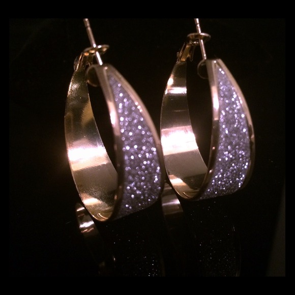 Women's gold hoop earrings with sparkle finish
