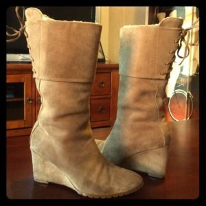 Tan genuine leather boots.