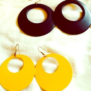Black earrings & yellow earrings.