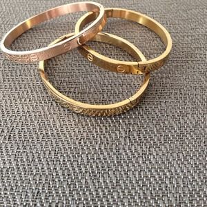 Cartier- inspired love bracelets/-used