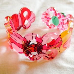 Pink multicolored plastic bracelet