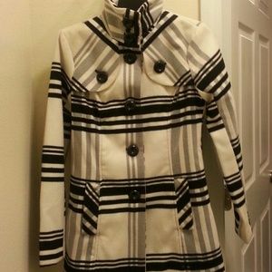 Black, white, and grey trench coat.