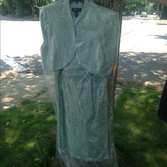 Green cocktail length dress with bolero jacket