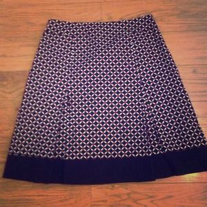 Black, red, and white patterned skirt