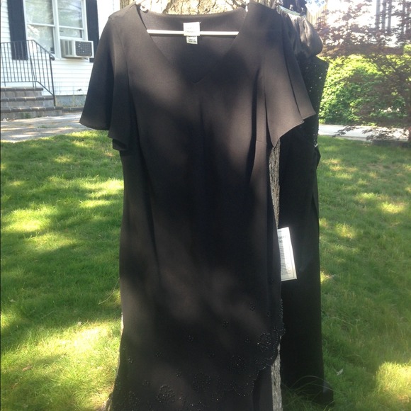 Black cocktail dress with beading on bottom