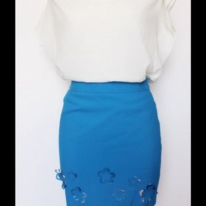 Top and high waist skirt.