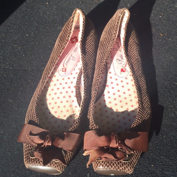 Brown snakeskin flats with bow detail