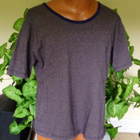 Blue short sleeved top.