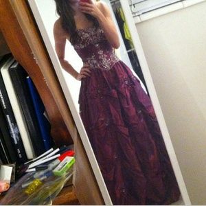 Plum colored juliet dress with silver beading.