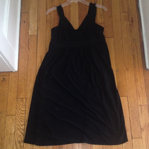Black dress with beading details.