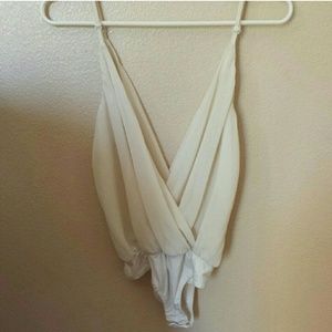 Creme colored body suit