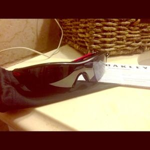 Hot pink Oakley sporty sunglasses