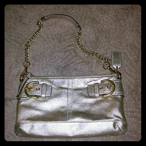 Gold coach purse