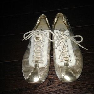 Authentic gold Coach shoes. SOLD