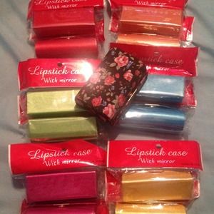 Lipstick case with mirror inside.