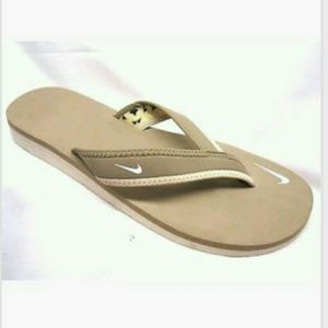 SOLD Nike Celso Tan white flip flops thongs