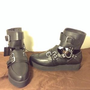 Black and silver cut out booties