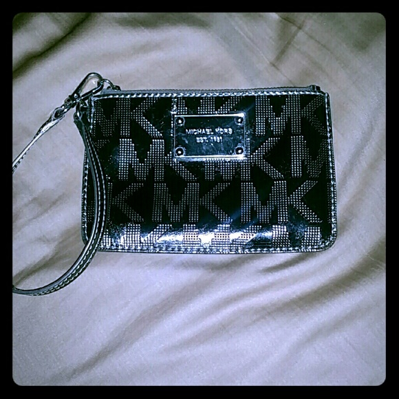 MK wristlet reserved