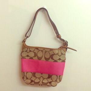 Cute summer Coach purse. Looks like new.