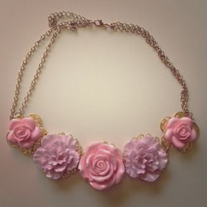 Pastel flower necklace with gold chain.