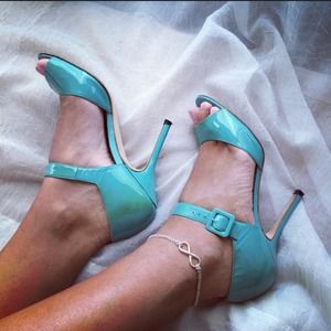 Teal Manolo Blahnik patent leather strapy sandals