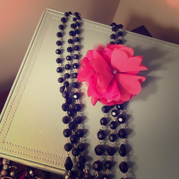 Black long necklace with pink flower