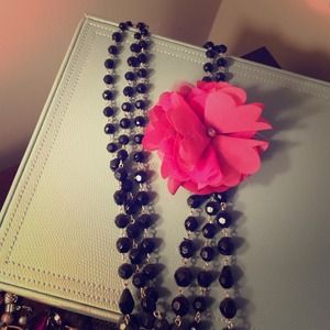 Black long necklace with pink flower