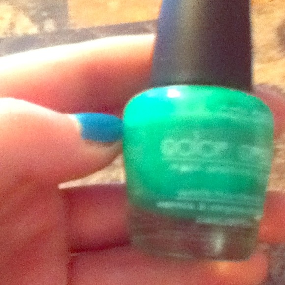 Green sparkly nail polish