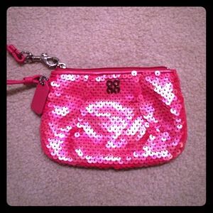 Gently used pink sequin coach wristlet