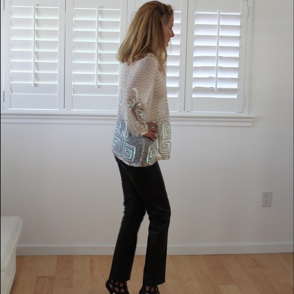 Beaded with sequins, in a creamy background. - Picture 3 of 3