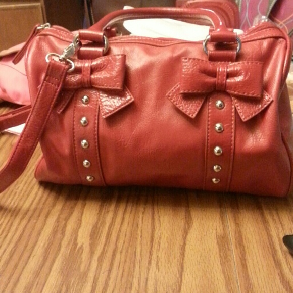 Red with two bows and studs