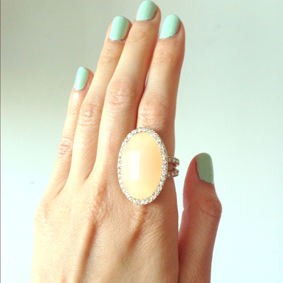 Cocktail ring with peach center stone